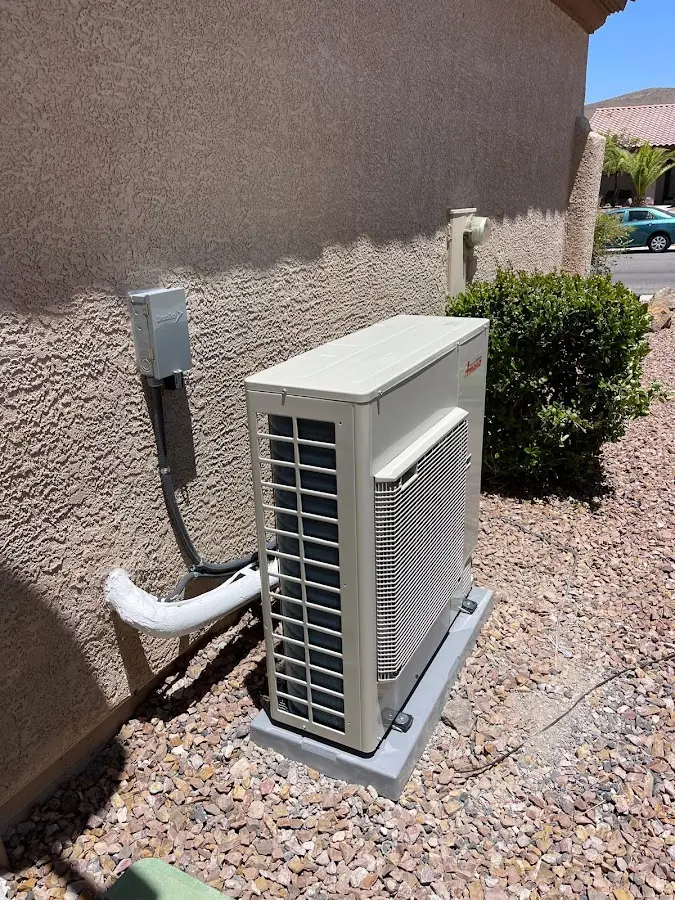 Residential air conditioning condenser unit in Moreau
